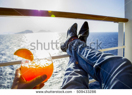 stock-photo-put-your-feet-up-on-the-railing-of-a-cruise-ship-509433286.jpg